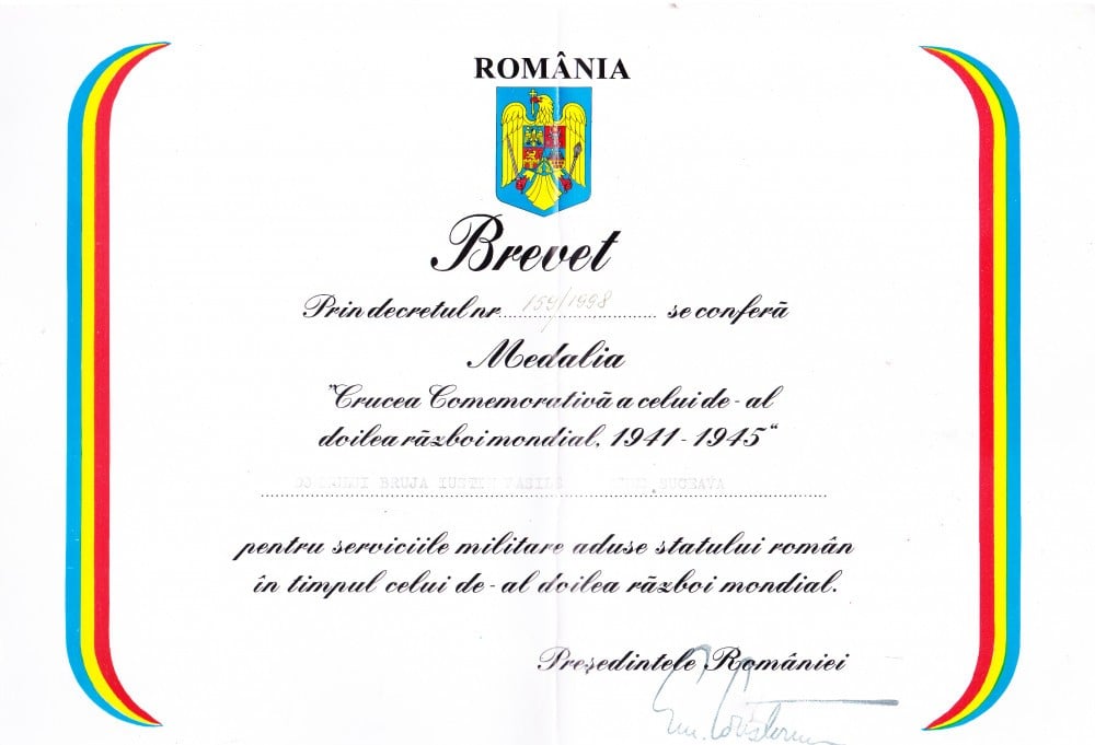 Fotografie: Crucea comemorativă a celui de-al Doilea Război Mondial 1941–1945, cu brevet și plic
